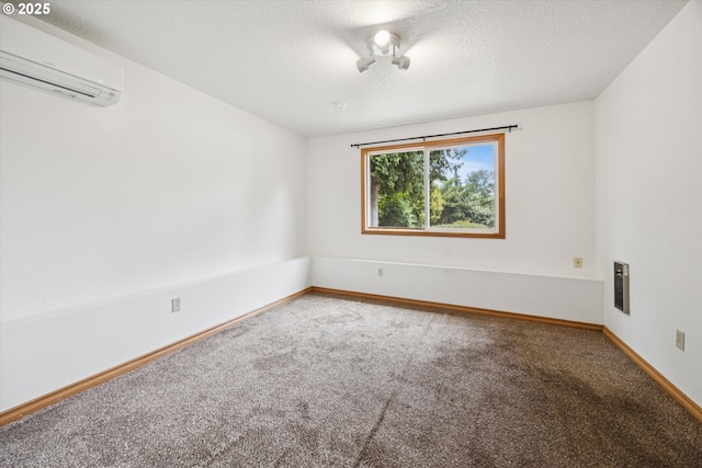 1625 SE Regner Rd, Gresham, OR 97080 - unfurnished room featuring an AC wall unit and carpet flooring