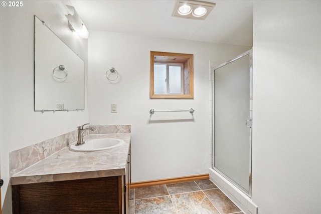 1625 SE Regner Rd, Gresham, OR 97080 - bathroom featuring vanity, a stall shower, and stone finish flooring