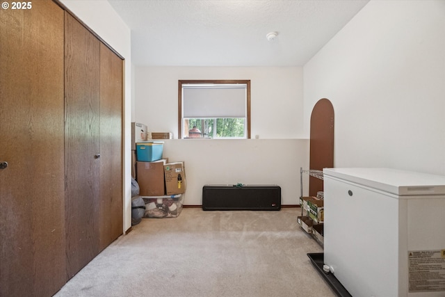 1625 SE Regner Rd, Gresham, OR 97080 - bedroom with fridge, carpet, and a closet