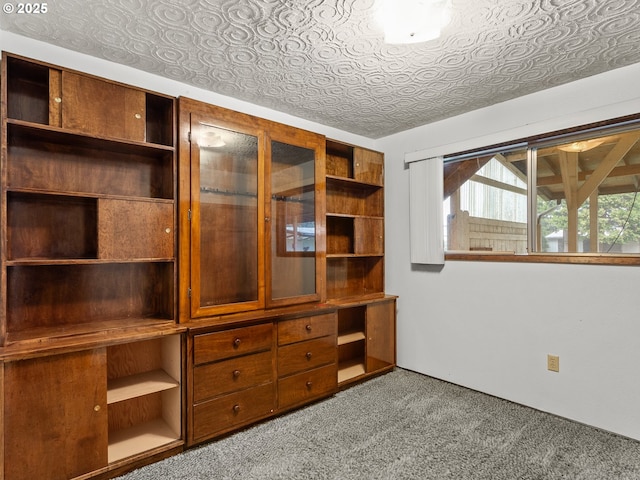 unfurnished bedroom featuring light carpet