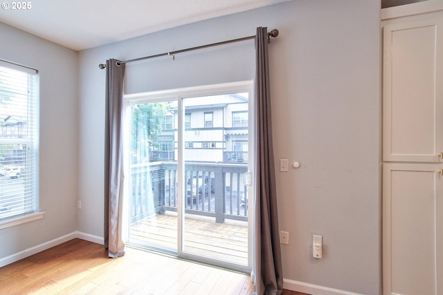 22860 SW Forest Creek Dr Unit 203, Sherwood, OR 97140 - spare room with plenty of natural light and light wood-style floors