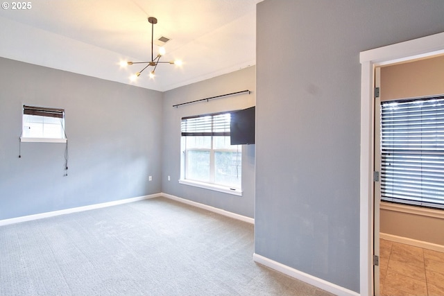 22860 SW Forest Creek Dr Unit 203, Sherwood, OR 97140 - unfurnished room featuring a chandelier and healthy amount of natural light