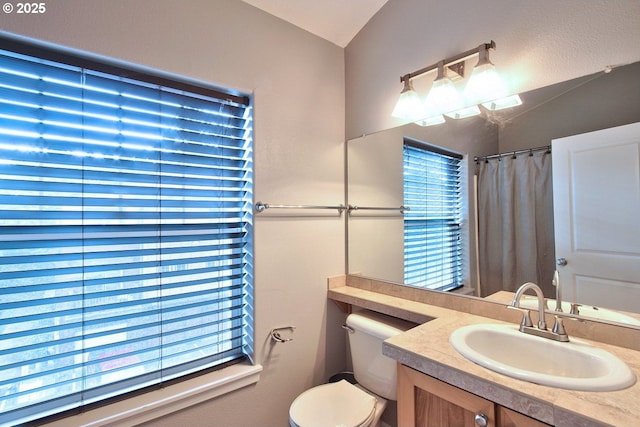22860 SW Forest Creek Dr Unit 203, Sherwood, OR 97140 - bathroom with vanity and lofted ceiling