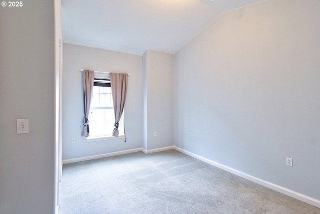 22860 SW Forest Creek Dr Unit 203, Sherwood, OR 97140 - carpeted spare room with vaulted ceiling and baseboards