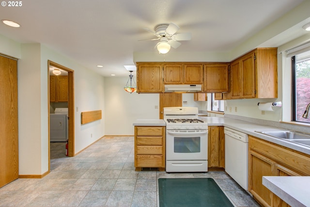kitchen with ceiling fan, a sink, white appliances, washer / clothes dryer, and under cabinet range hood