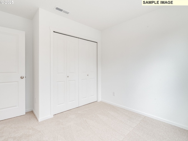 5416 NE 66th Pl, Vancouver, WA 98661 - unfurnished bedroom featuring carpet flooring, baseboards, and a closet