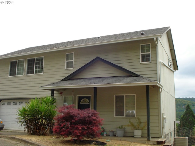131 NW Makah Ct, Roseburg, OR 97471 - view of front of property featuring a garage and roof with shingles
