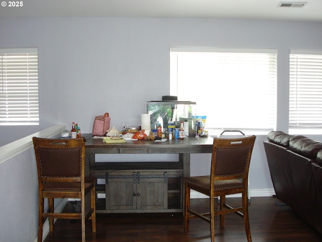 131 NW Makah Ct, Roseburg, OR 97471 - bar area featuring dark wood finished floors and baseboards