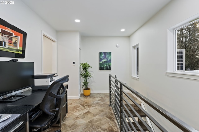 office with recessed lighting and baseboards
