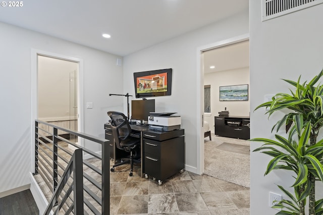 office area with light carpet, visible vents, recessed lighting, and baseboards