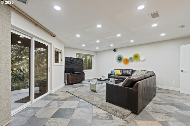 living room featuring visible vents, recessed lighting, and baseboards