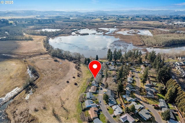 aerial view with a water and mountain view