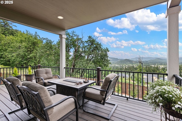 962 S 66th Pl, Springfield, OR 97478 - deck with a mountain view and an outdoor living space with a fire pit