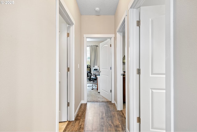 962 S 66th Pl, Springfield, OR 97478 - hallway with wood-type flooring, baseboards, and an office area