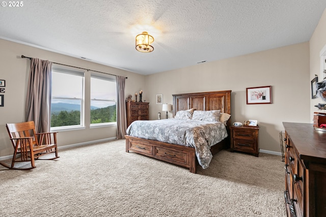 962 S 66th Pl, Springfield, OR 97478 - bedroom with light colored carpet, baseboards, and a textured ceiling