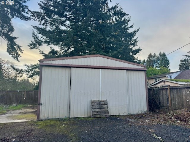 view of outdoor structure at dusk