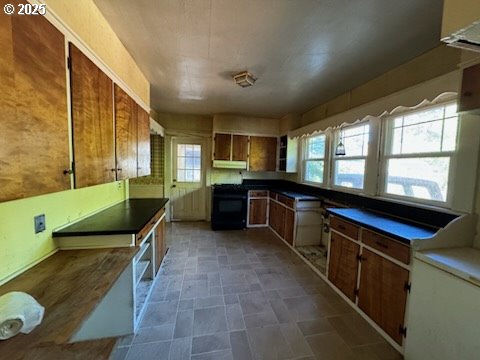 kitchen featuring black gas stove