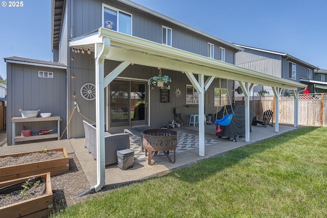 1366 Cramner St, Lafayette, OR 97127 - back of house featuring a patio area, a garden, and a fire pit