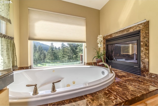 21626 Glaze Rd, Veneta, OR 97487 - bathroom with a tub with jets and a high end fireplace