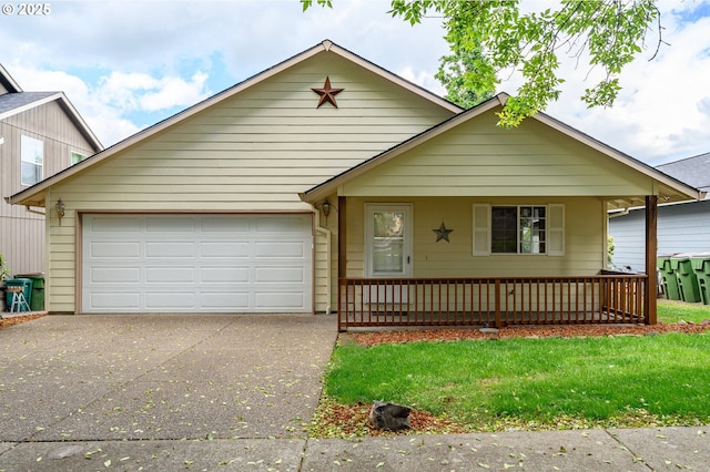 1301 E Sunset Dr, Newberg, OR 97132 - view of front of home with driveway, a garage, covered porch, and a front lawn
