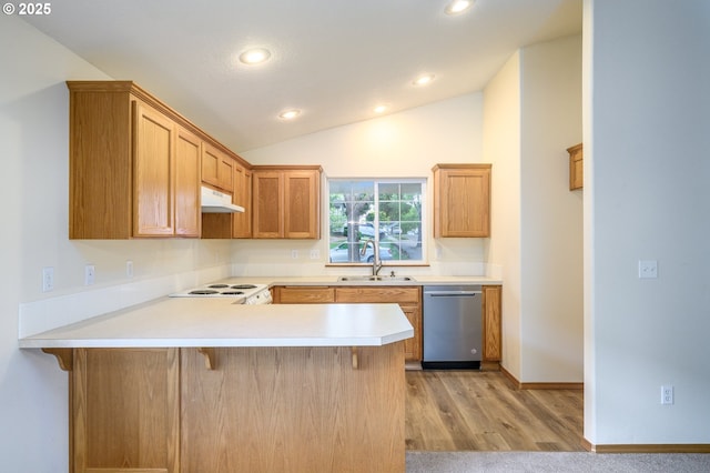 1301 E Sunset Dr, Newberg, OR 97132 - kitchen with dishwasher, a sink, a peninsula, light countertops, and lofted ceiling