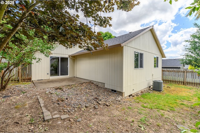 1301 E Sunset Dr, Newberg, OR 97132 - rear view of property with a patio and roof with shingles