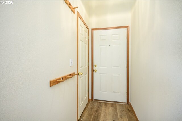 1301 E Sunset Dr, Newberg, OR 97132 - doorway with light wood-style floors and baseboards