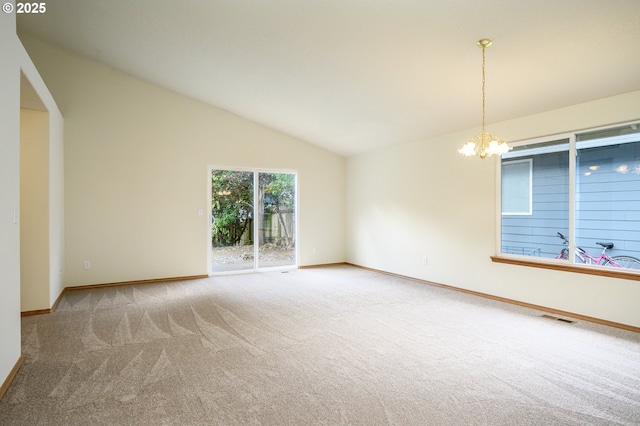 1301 E Sunset Dr, Newberg, OR 97132 - spare room with carpet, a chandelier, baseboards, and lofted ceiling