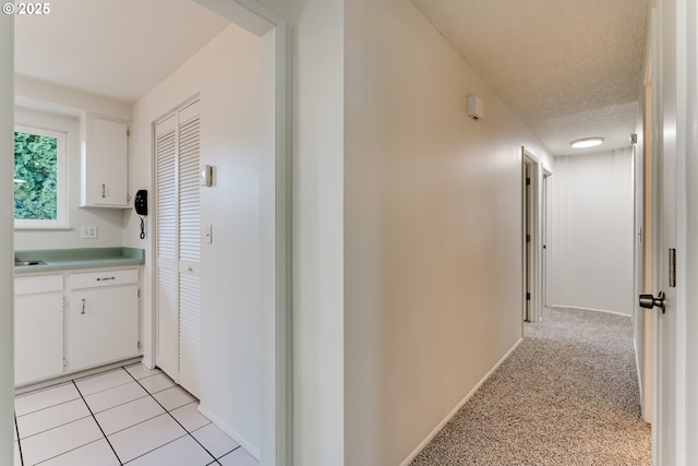 331 Limerick Ave, Eugene, OR 97404 - hall featuring a textured ceiling and baseboards
