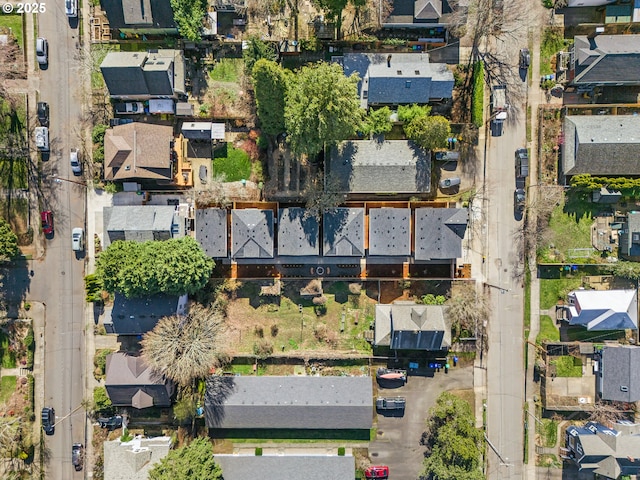 birds eye view of property with a residential view