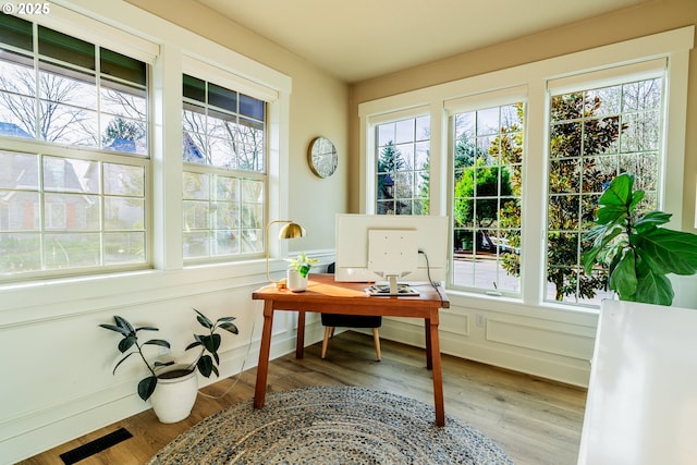 sunroom with plenty of natural light