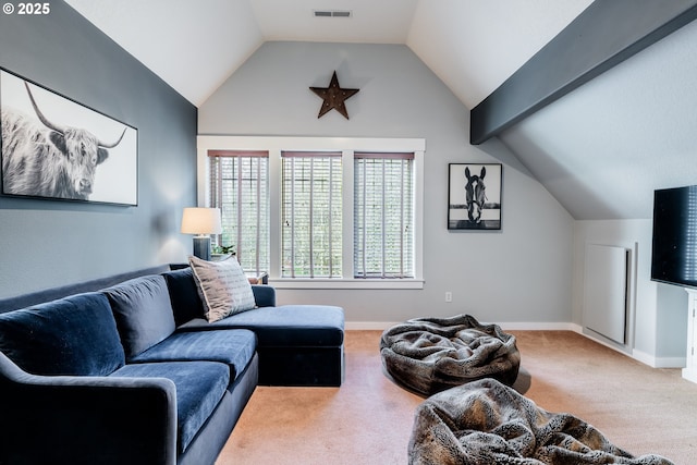 living room with vaulted ceiling and carpet