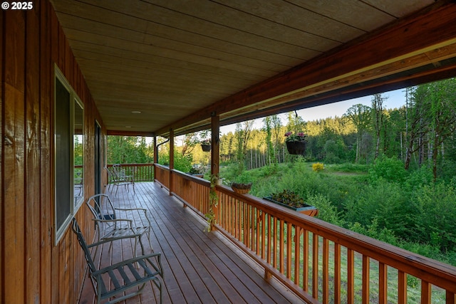 wooden terrace with covered porch