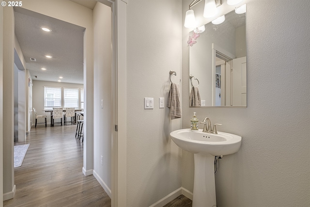 30942 NW Turel Dr, North Plains, OR 97133 - bathroom with wood finished floors, recessed lighting, and baseboards
