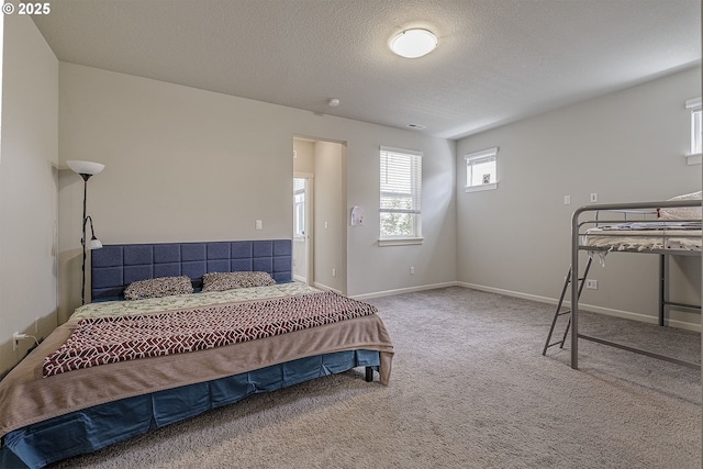 30942 NW Turel Dr, North Plains, OR 97133 - bedroom with carpet, baseboards, and a textured ceiling