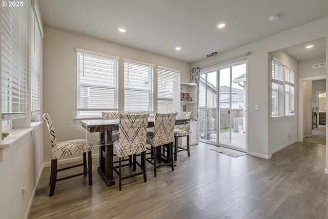 30942 NW Turel Dr, North Plains, OR 97133 - dining space with wood finished floors, baseboards, and recessed lighting