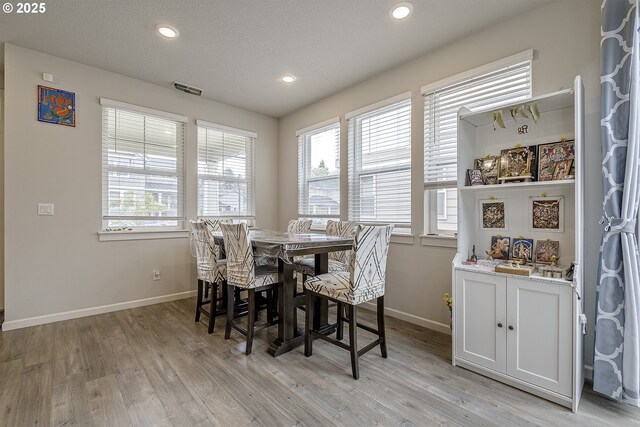 30942 NW Turel Dr, North Plains, OR 97133 - dining area with baseboards, healthy amount of natural light, light wood finished floors, and recessed lighting