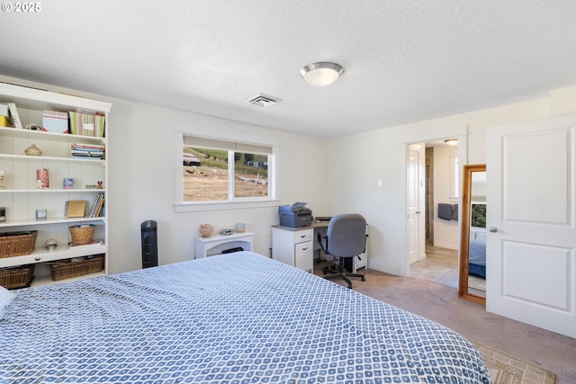 5073 Chenoweth Rd, The Dalles, OR 97058 - carpeted bedroom featuring a textured ceiling