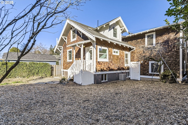 view of front of property with cooling unit