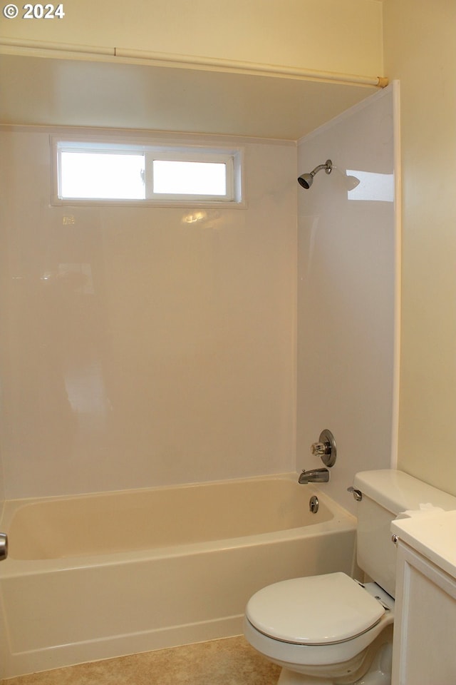 bathroom featuring tub / shower combination, toilet, and vanity