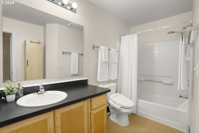 bathroom with vanity, toilet, and shower / bath combo