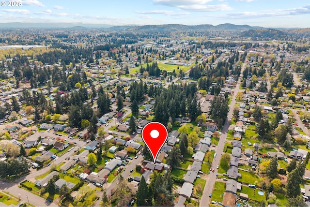 bird's eye view featuring a mountain view and a residential view
