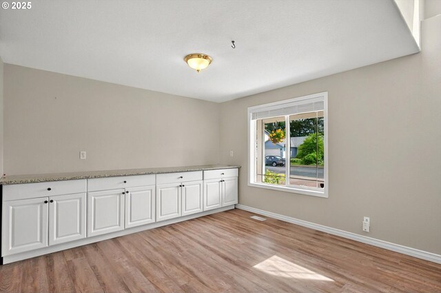 110 Wilshire Way, Kelso, WA 98626 - unfurnished room featuring light wood-style flooring and baseboards