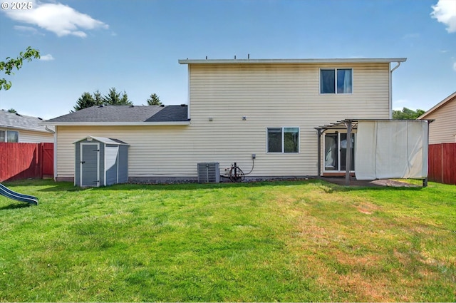 110 Wilshire Way, Kelso, WA 98626 - back of property featuring central AC, a storage shed, and an outdoor structure