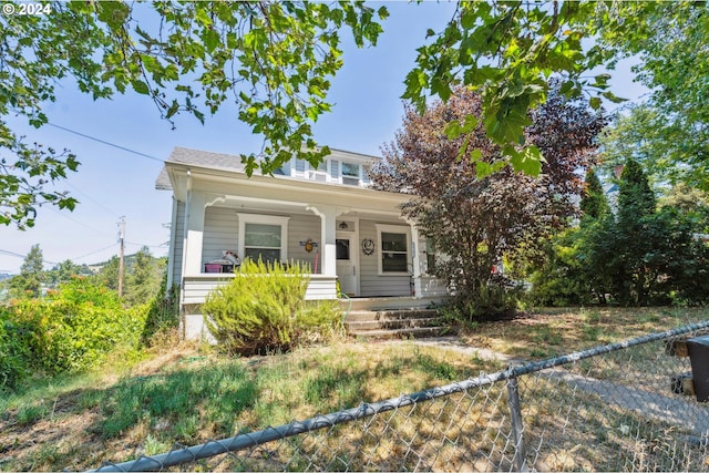 view of front of property featuring covered porch