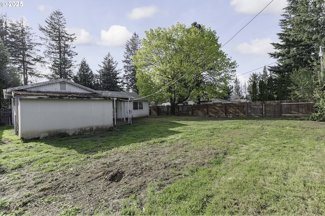 view of yard featuring a fenced backyard