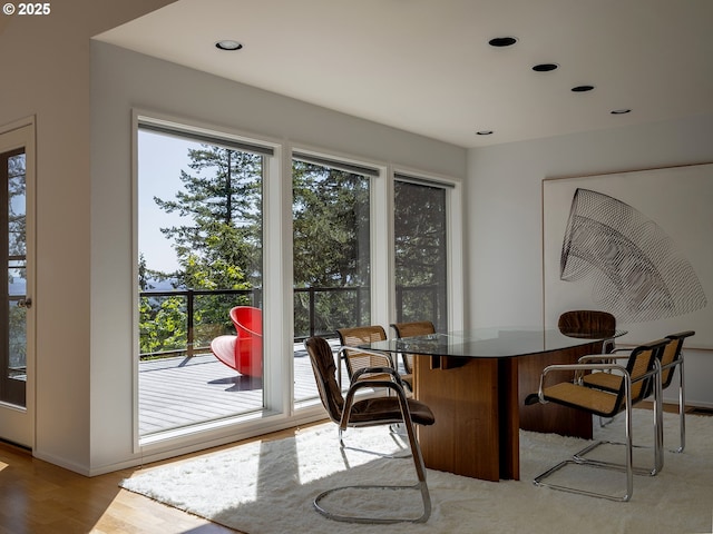 3342 SW Fairmount Blvd, Portland, OR 97239 - dining room with light wood-style floors, baseboards, and recessed lighting