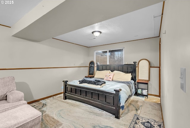 bedroom featuring baseboards