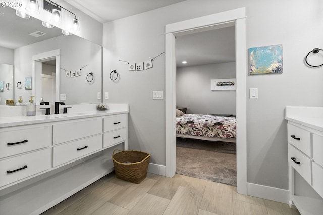 3588 Nestucca Loop, Eugene, OR 97408 - ensuite bathroom featuring vanity and wood finished floors