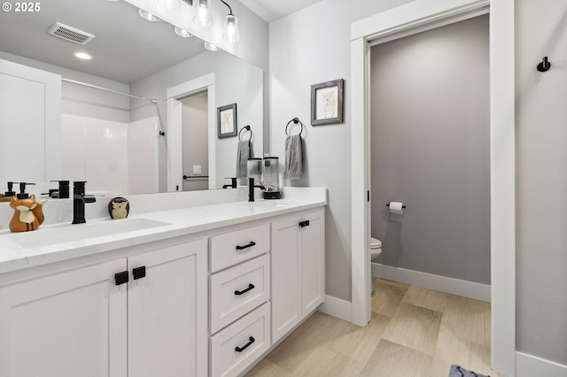 3588 Nestucca Loop, Eugene, OR 97408 - bathroom with double vanity and a shower